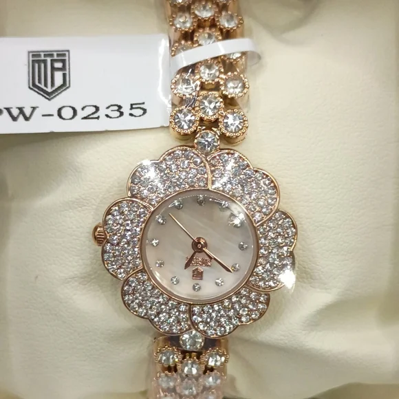 Montres Prestige X Invicta women's watch in rose gold tone with a flower-shaped, - Picture 2 of 3